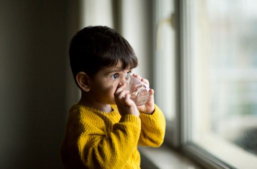 Child drinking water.