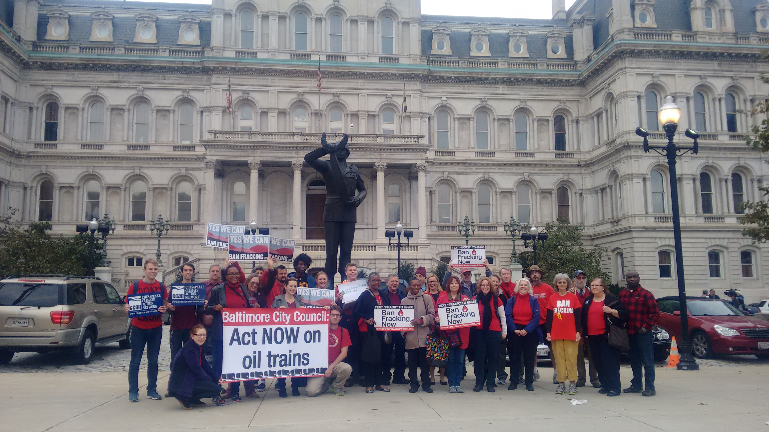 Rally Against Oil Trains - November - Baltimore Over 30 Baltimore residents outside of City Hall wearing red in support of the Oil Trains Ordinance