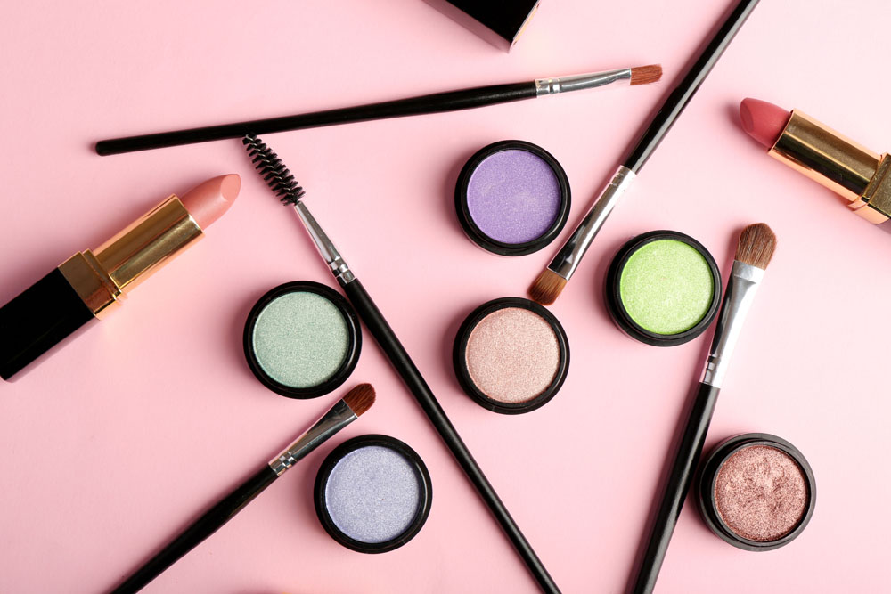 Cosmetics - lipstick, other makeup - arranged on a table. Photo credit: AfricaStudios / Shutterstock Cosmetics - lipstick, other makeup - arranged on a table. Photo credit: AfricaStudios / Shutterstock