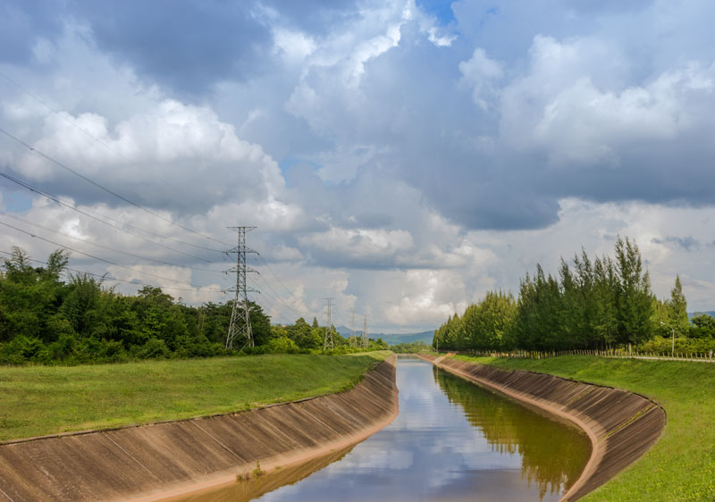 Manmade canal on a sunny day. Photo credit: nayneung1 / Shutterstock Manmade canal on a sunny day. Photo credit: nayneung1 / Shutterstock