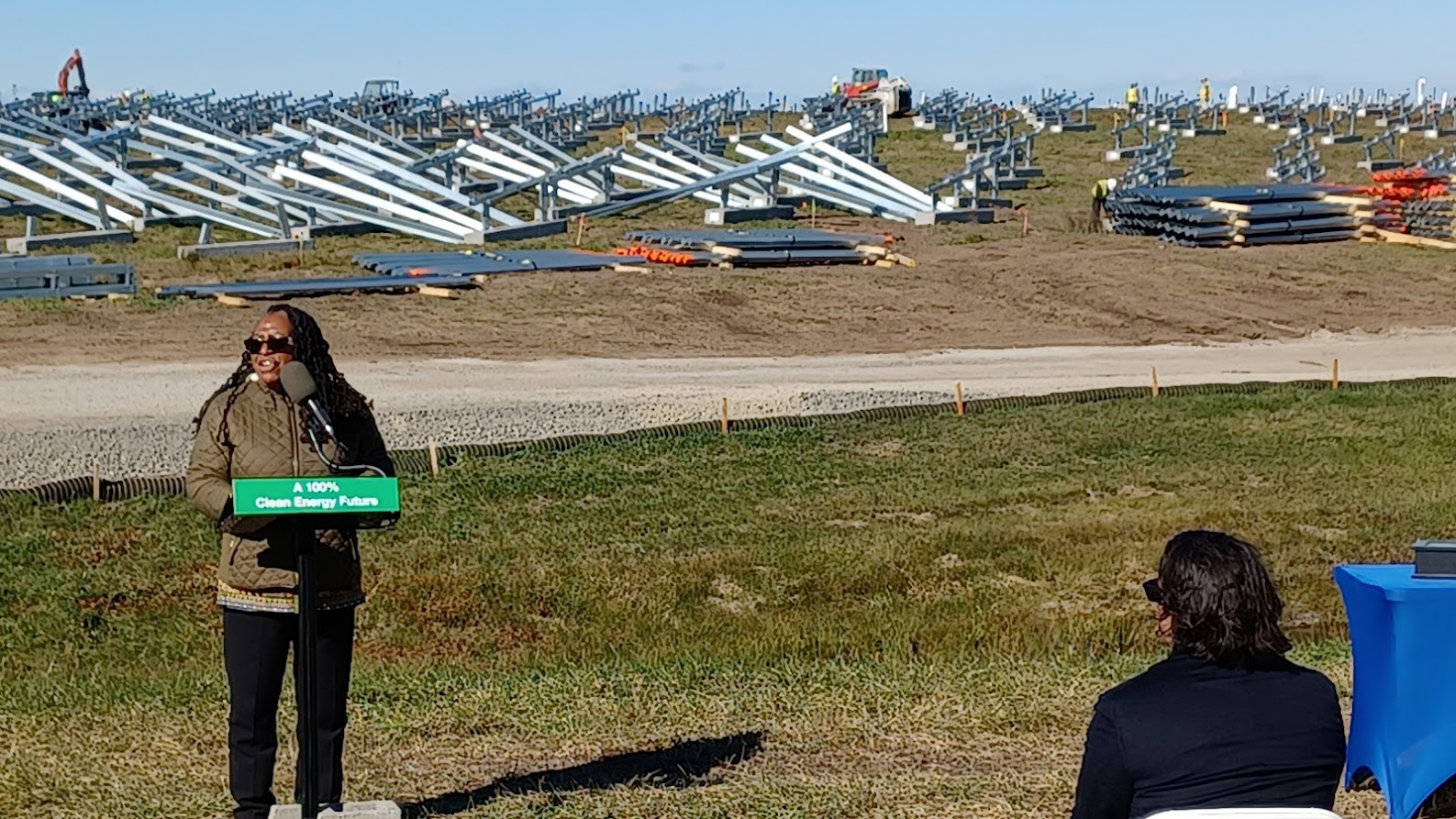 Environmental Justice Director, Kim Gaddy speaking at press conference, as workers continued to install the nation’s largest solar farm on reclaimed landfill.