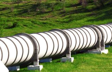 White pipeline, green field