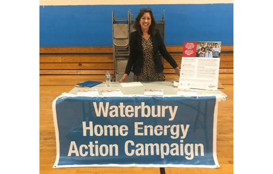 Image of Anne Hulick, Clean Water Action State Director tabling for Waterbury Home Energy Action Campaign
